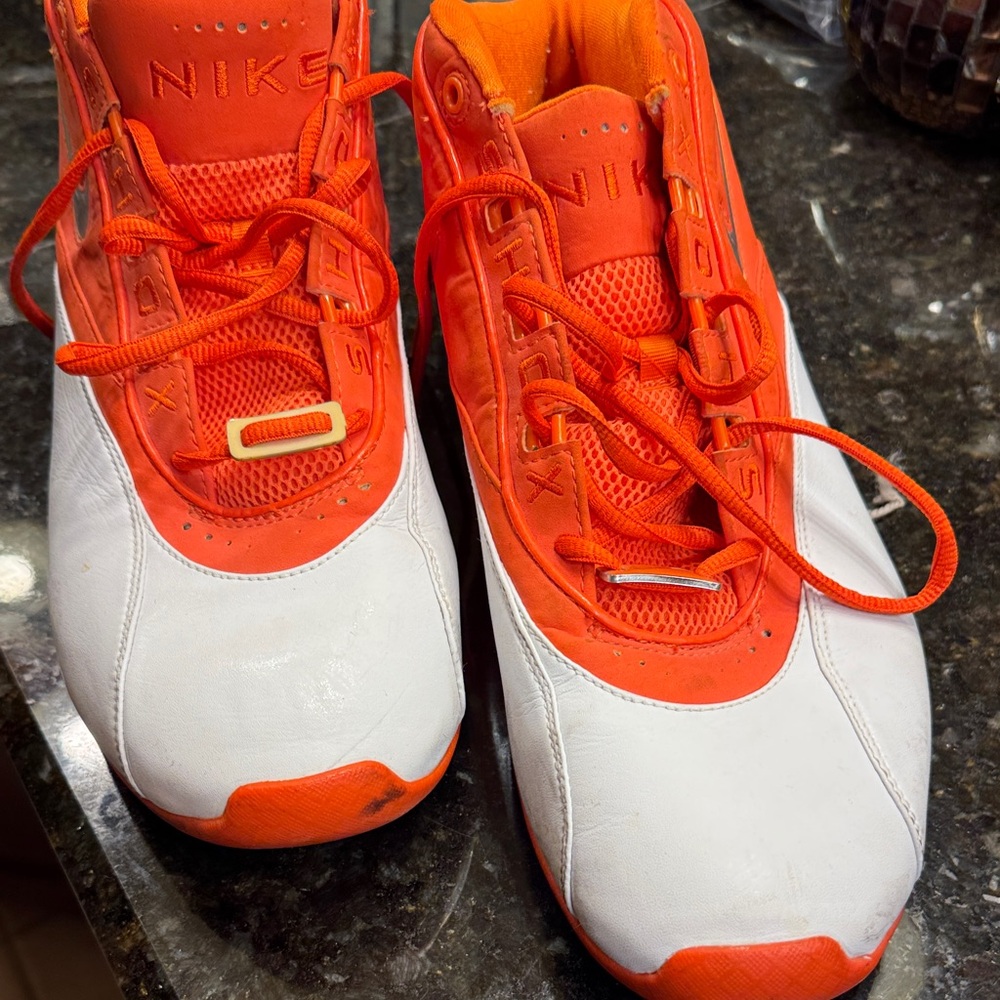 Nike Bright Orange and White Athletic Shoes. Check out the soles!!!